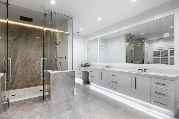 Bathroom, Dual Sink Vanities, Glass Shower, Interior, Marble, Marble Walls, Recessed Lighting