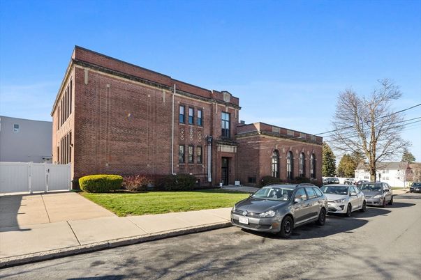 Exterior, Facade, Brick Facade, Condo Building