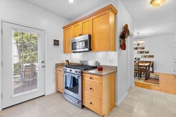 Chandelier, Dining room, Interior, Kitchen, Recessed Lighting, Stainless Steel Appliances, Wood Texture Flooring