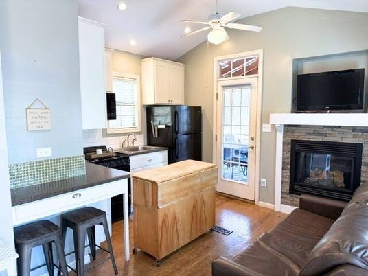 Fireplace, Interior, Kitchen, Living room, Recessed Lighting, Wood Texture Flooring