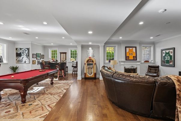 Billiard Table, Fireplace, Game Room, Interior, Living room, Recessed Lighting, Wood Texture Flooring
