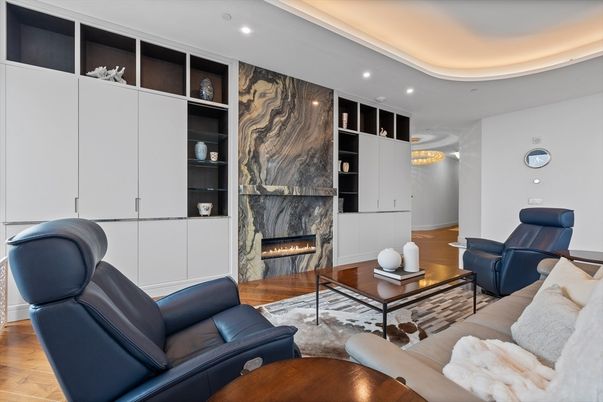 Fireplace, Interior, Living room, Marble Walls, Recessed Lighting, Wood Texture Flooring
