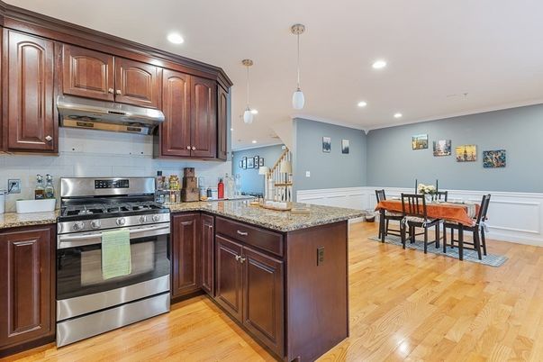 Dining room, Interior, Kitchen, Pendant Lights, Recessed Lighting, Stainless Steel Appliances, Wood Texture Flooring