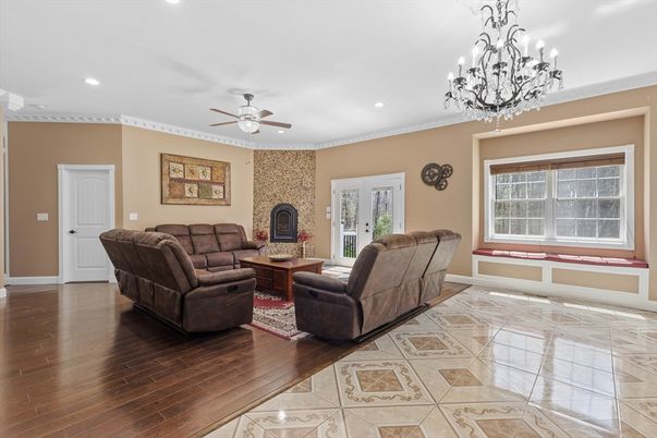 Chandelier, Fireplace, Interior, Living room, Recessed Lighting, Wood Texture Flooring