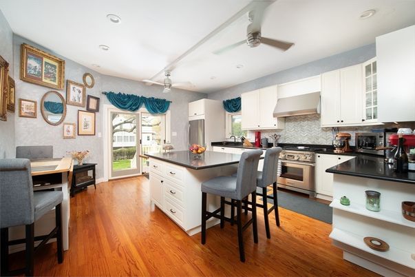 Dining room, Interior, Kitchen, Recessed Lighting, Stainless Steel Appliances, Wood Texture Flooring