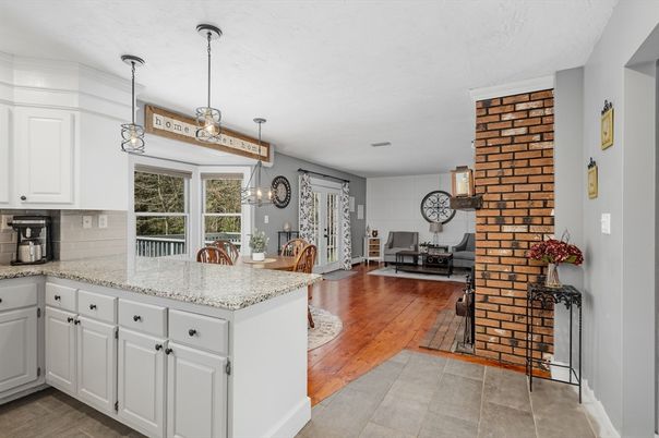 Dining room, Fireplace, Interior, Kitchen, Pendant Lights, Wood Texture Flooring