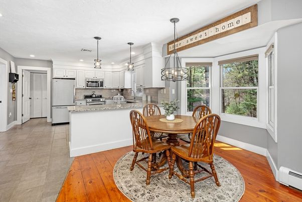 Dining room, Interior, Kitchen, Pendant Lights, Recessed Lighting, Stainless Steel Appliances, Wood Texture Flooring