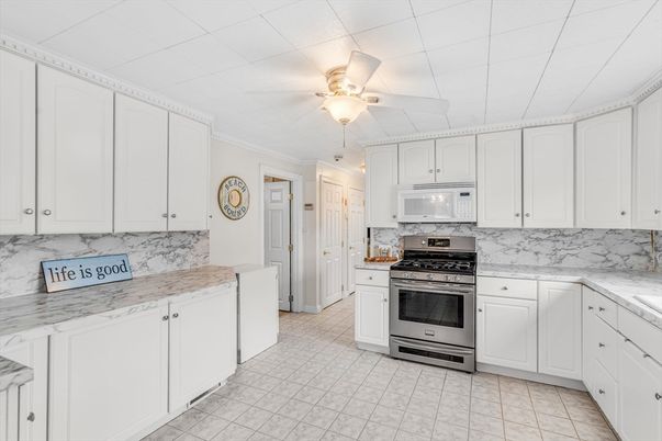 Interior, Kitchen, Marble Walls, Stainless Steel Appliances