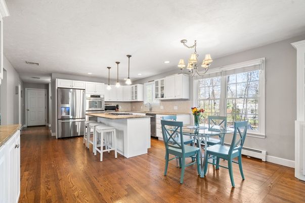 Chandelier, Dining room, Interior, Kitchen, Pendant Lights, Recessed Lighting, Stainless Steel Appliances, Wood Texture Flooring