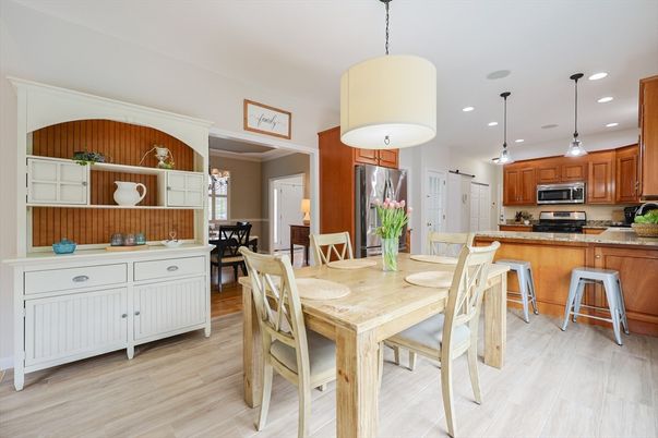 Dining room, Interior, Kitchen, Pendant Lights, Recessed Lighting, Stainless Steel Appliances, Wood Texture Flooring