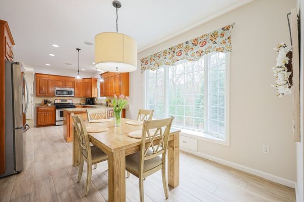 Dining room, Interior, Kitchen, Pendant Lights, Recessed Lighting, Stainless Steel Appliances, Wood Texture Flooring