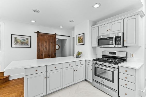 Interior, Kitchen, Marble, Recessed Lighting, Stainless Steel Appliances, Wood Texture Flooring