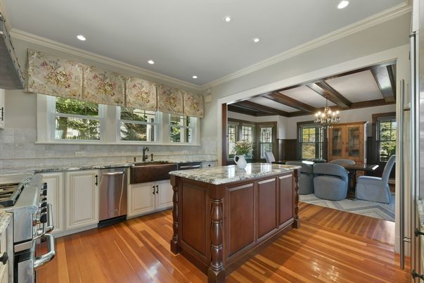 Chandelier, Dining room, Interior, Kitchen, Living room, Recessed Lighting, Stainless Steel Appliances, Wooden Beams, Wood Texture Flooring