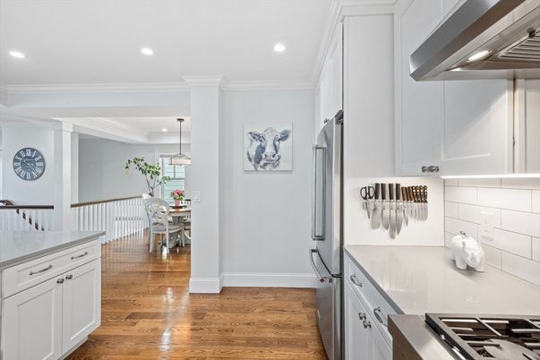 Dining room, Interior, Kitchen, Pendant Lights, Recessed Lighting, Stainless Steel Appliances, Wood Texture Flooring