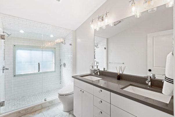 Bathroom, Dual Sink Vanities, Glass Shower, Interior, Marble, Recessed Lighting