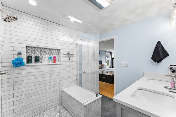 Bathroom, Dual Sink Vanities, Glass Shower, Interior, Recessed Lighting, Wood Texture Flooring