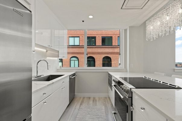 Chandelier, Fireplace, Interior, Kitchen, Living room, Recessed Lighting, Wood Texture Flooring