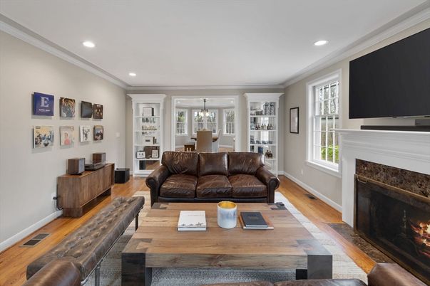 Dining room, Fireplace, Interior, Living room, Pendant Lights, Recessed Lighting, Wood Texture Flooring