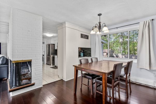 Chandelier, Dining room, Interior, Kitchen, Stainless Steel Appliances, Stone Walls, Wood Texture Flooring