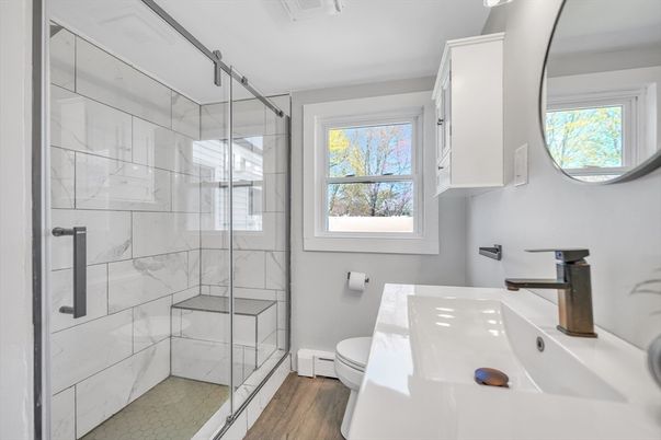 Bathroom, Glass Shower, Interior, Marble Walls, Wood Texture Flooring