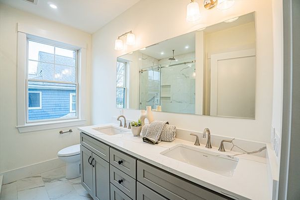 Bathroom, Dual Sink Vanities, Glass Shower, Interior, Marble, Marble Walls, Recessed Lighting