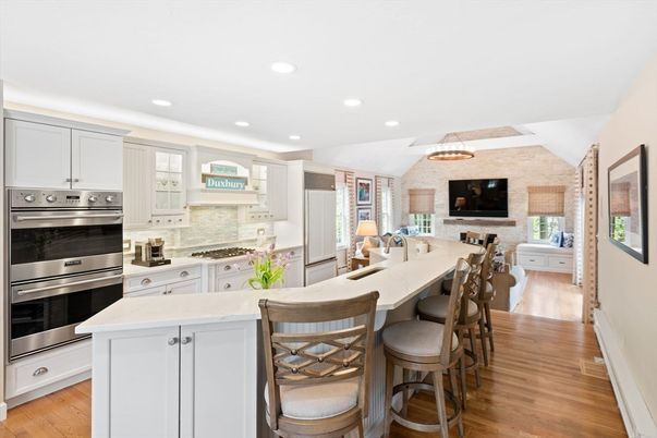 Interior, Kitchen, Pendant Lights, Recessed Lighting, Stainless Steel Appliances, Stone Walls, Wood Texture Flooring