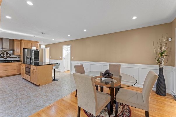 Dining room, Interior, Kitchen, Pendant Lights, Recessed Lighting, Stainless Steel Appliances, Wood Texture Flooring
