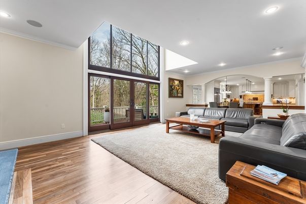 Fireplace, Interior, Living room, Recessed Lighting, Stone Walls, Wood Texture Flooring