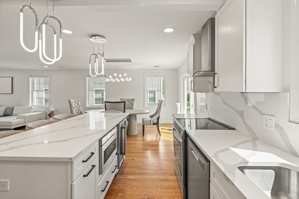 Dining room, Interior, Kitchen, Living room, Pendant Lights, Recessed Lighting, Stainless Steel Appliances, Wood Texture Flooring