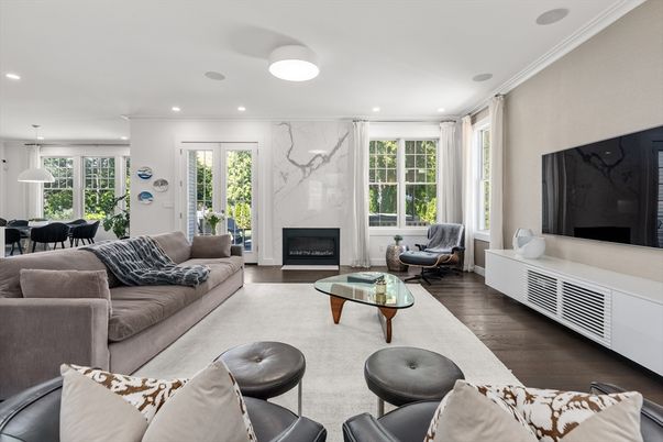 Dining room, Fireplace, Interior, Living room, Marble Walls, Pendant Lights, Recessed Lighting, Wood Texture Flooring