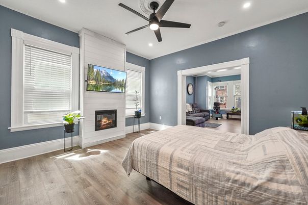 Bedroom, Fireplace, Interior, Recessed Lighting, Wood Texture Flooring