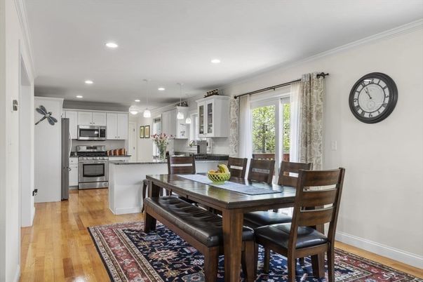 Dining room, Interior, Kitchen, Pendant Lights, Recessed Lighting, Stainless Steel Appliances, Wood Texture Flooring