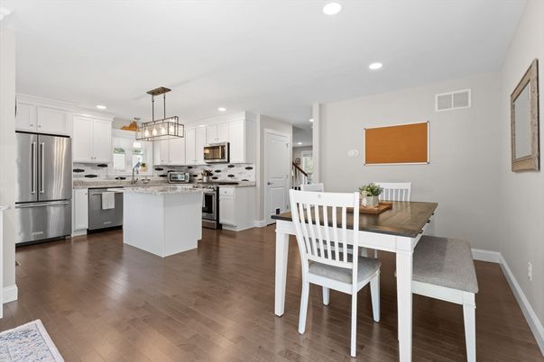 Dining room, Interior, Kitchen, Pendant Lights, Recessed Lighting, Stainless Steel Appliances, Wood Texture Flooring