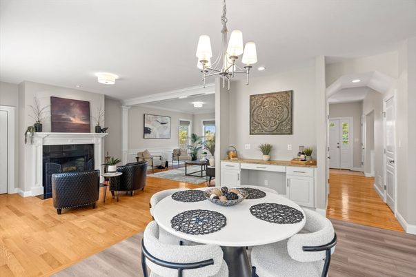 Chandelier, Dining room, Fireplace, Interior, Living room, Recessed Lighting, Wood Texture Flooring