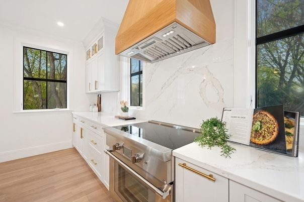 Interior, Kitchen, Marble Walls, Recessed Lighting, Stainless Steel Appliances, Wood Texture Flooring