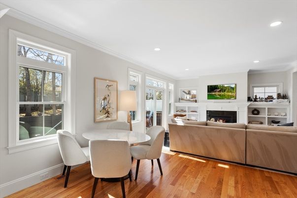 Dining room, Fireplace, Interior, Living room, Recessed Lighting, Wood Texture Flooring