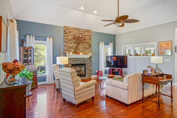 Fireplace, Interior, Living room, Recessed Lighting, Stone Walls, Wood Texture Flooring