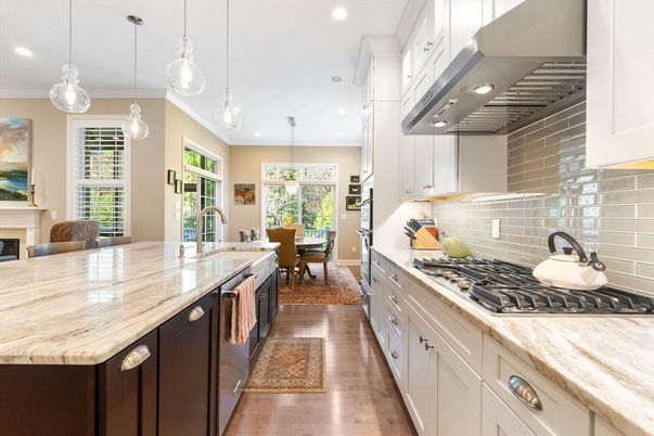 Dining room, Fireplace, Interior, Kitchen, Pendant Lights, Recessed Lighting, Stainless Steel Appliances, Wood Texture Flooring
