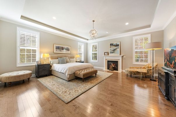 Bedroom, Chandelier, Fireplace, Interior, Recessed Lighting, Wood Texture Flooring