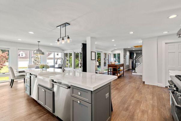 Dining room, Interior, Kitchen, Pendant Lights, Recessed Lighting, Stainless Steel Appliances, Wood Texture Flooring