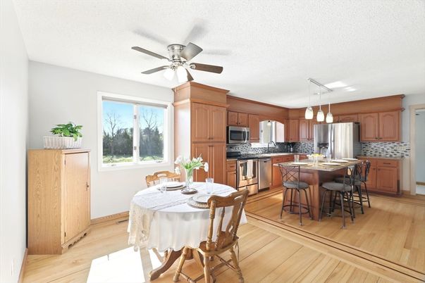 Dining room, Interior, Kitchen, Pendant Lights, Stainless Steel Appliances, Wood Texture Flooring