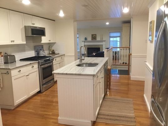Fireplace, Interior, Kitchen, Recessed Lighting, Stainless Steel Appliances, Wood Texture Flooring