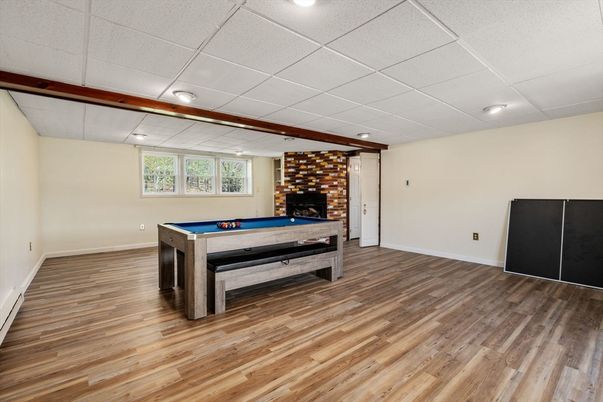 Billiard Table, Fireplace, Game Room, Interior, Recessed Lighting, Stone Walls, Wood Texture Flooring