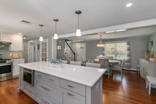 Dining room, Interior, Kitchen, Pendant Lights, Recessed Lighting, Stainless Steel Appliances, Wood Texture Flooring