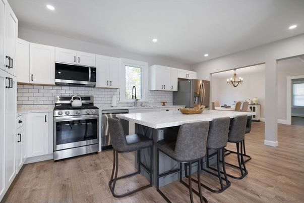 Chandelier, Interior, Kitchen, Recessed Lighting, Stainless Steel Appliances, Wood Texture Flooring