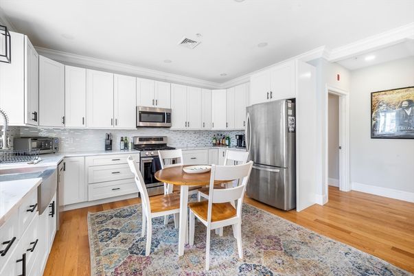Dining room, Interior, Kitchen, Recessed Lighting, Stainless Steel Appliances, Wood Texture Flooring