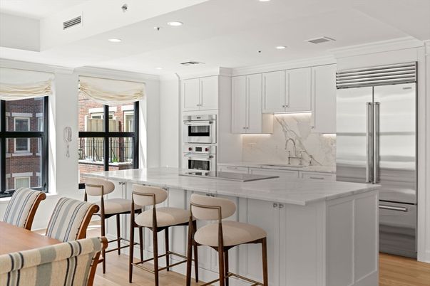 Interior, Kitchen, Marble Walls, Recessed Lighting, Stainless Steel Appliances, Wood Texture Flooring