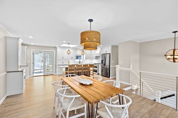 Chandelier, Dining room, Interior, Kitchen, Pendant Lights, Recessed Lighting, Stainless Steel Appliances, Wood Texture Flooring