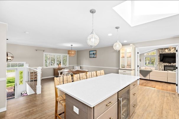 Chandelier, Dining room, Fireplace, Interior, Kitchen, Living room, Pendant Lights, Recessed Lighting, Wood Texture Flooring