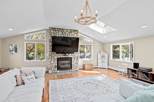 Chandelier, Fireplace, Interior, Living room, Recessed Lighting, Wood Texture Flooring